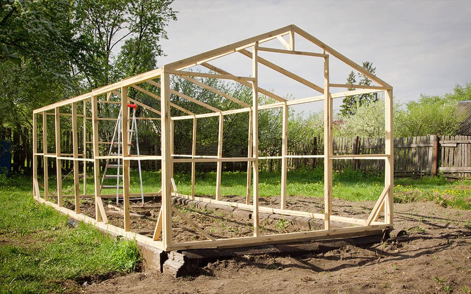 build a greenhouse or buy a greenhouse